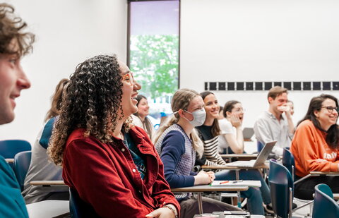 Students laughing in Spanish classroom