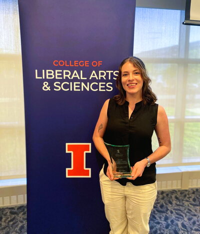 Photo of Sara with award